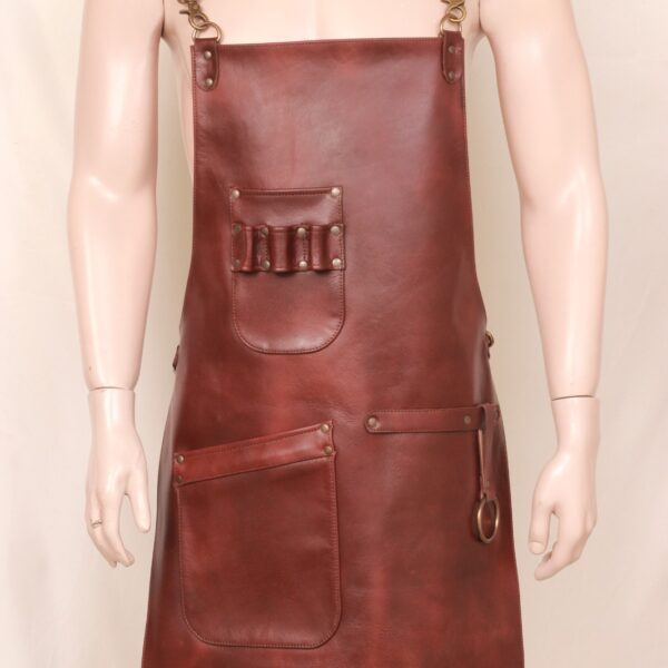 Brown leather apron with tool holders and towel strap