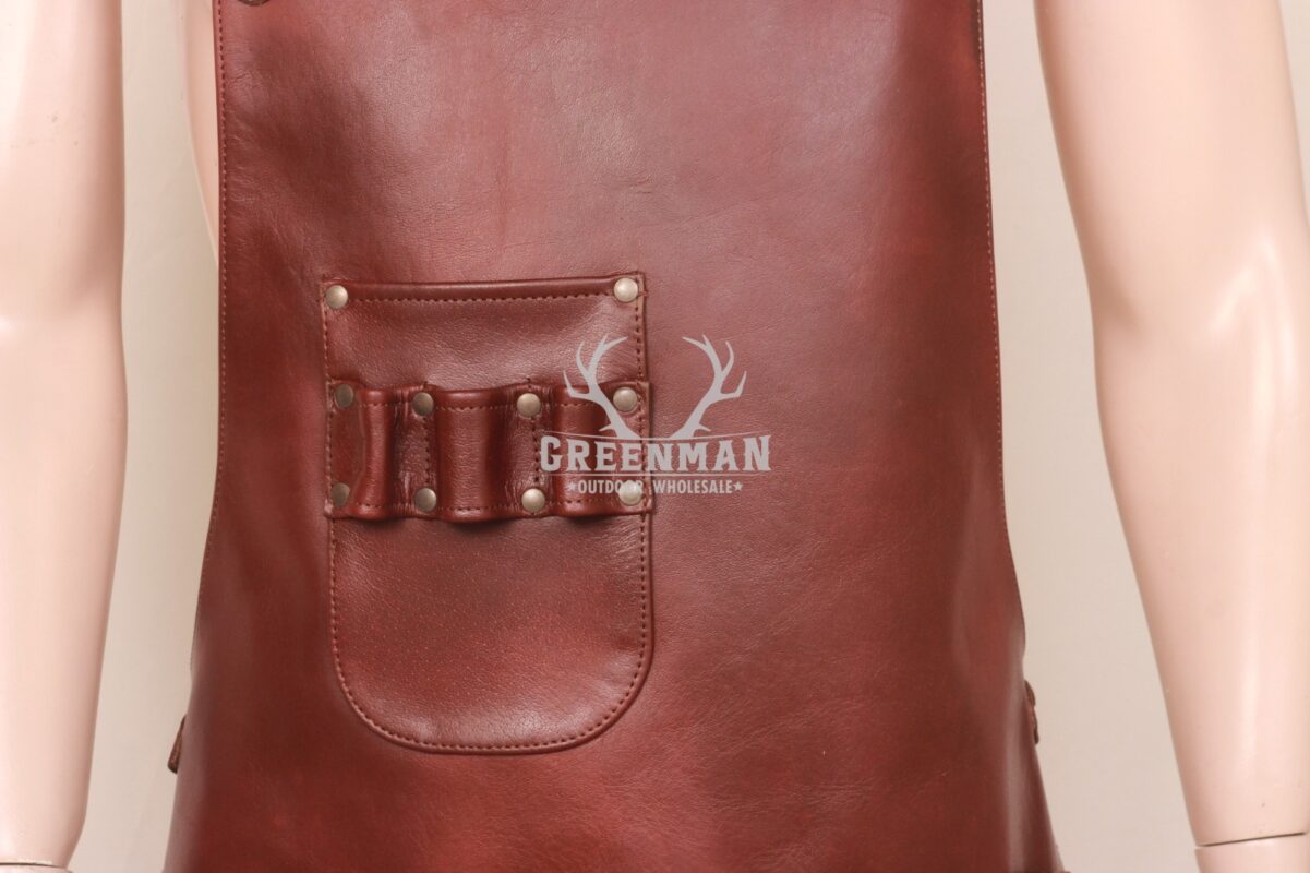 Brown leather apron with tool holders and towel strap