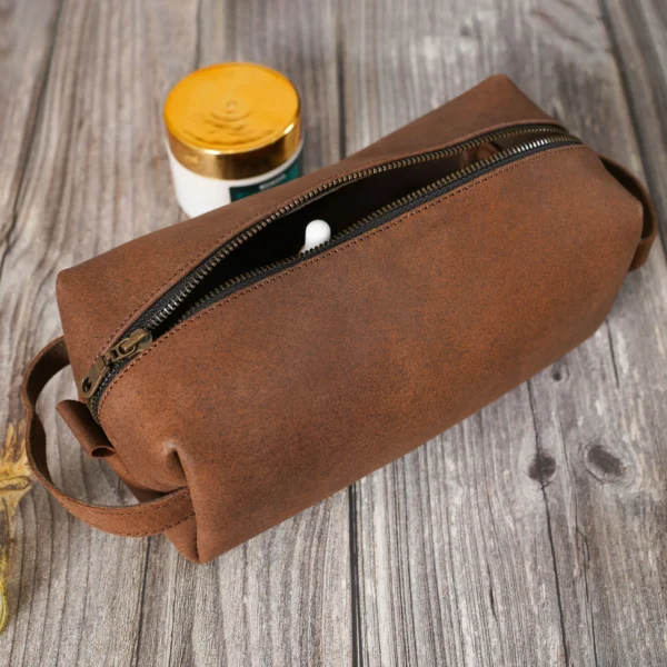 brown leather toiletry bag, toiletry bag